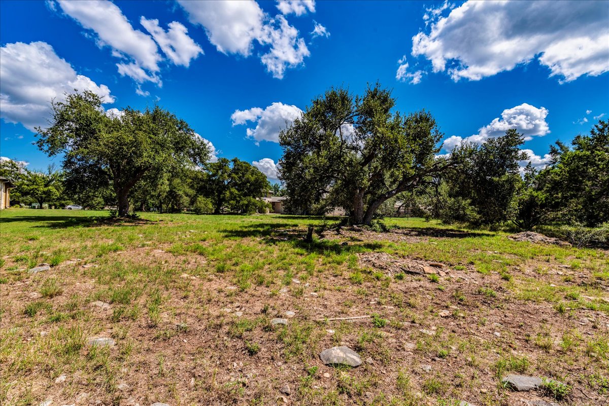 10299 Brangus Road Driftwood, TX 78619 - Photo 7 of 16 View of yard featuring a view of countryside