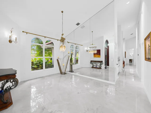 a kitchen with stainless steel appliances granite countertop a stove a sink dishwasher and cabinets