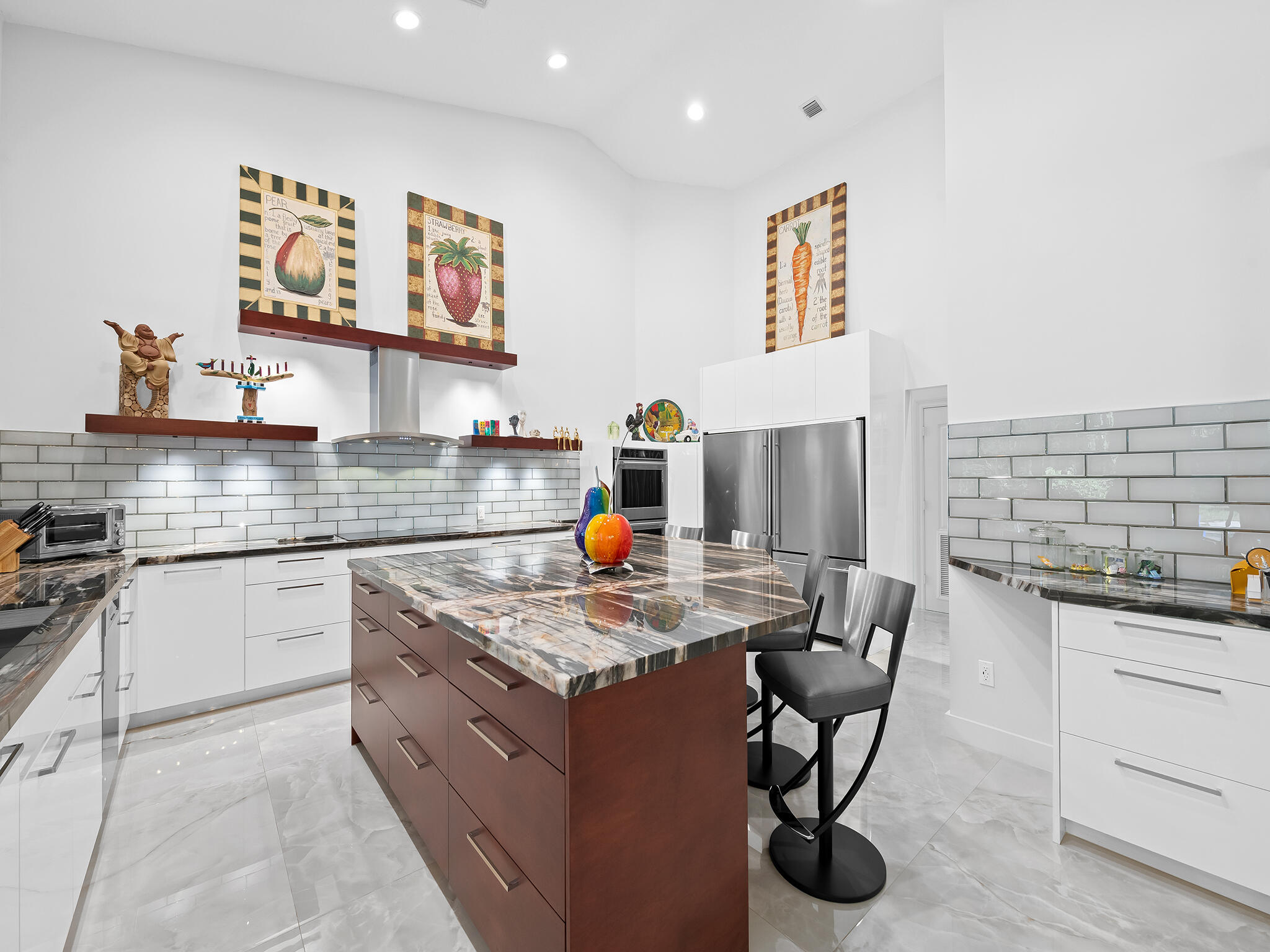 17888 Fieldbrook Circle East Boca Raton, FL 33496 - Photo 16 of 68 a kitchen with stainless steel appliances granite countertop a stove a sink dishwasher and cabinets
