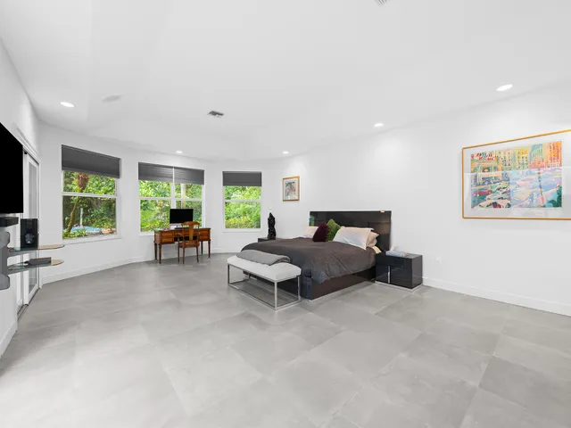 a en suite bathroom with a sink and a mirror