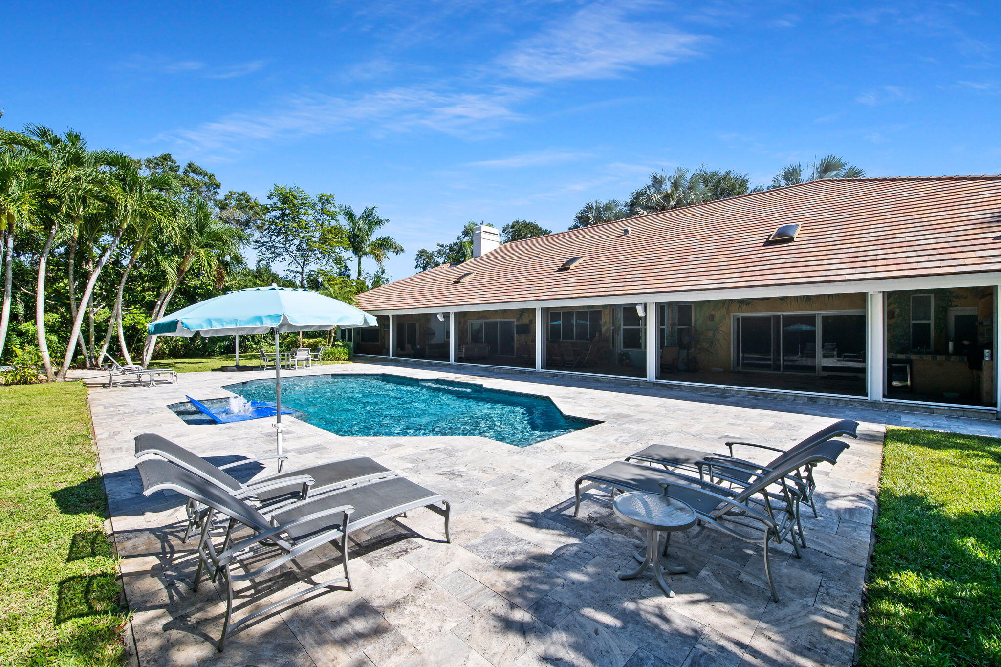 17888 Fieldbrook Circle East Boca Raton, FL 33496 - Photo 37 of 68 a view of a house with backyard sitting area and garden