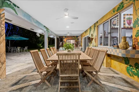 a view of a park with large trees