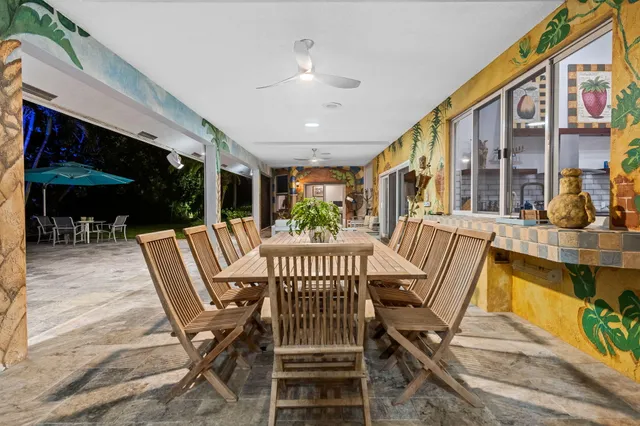 a view of a park with large trees