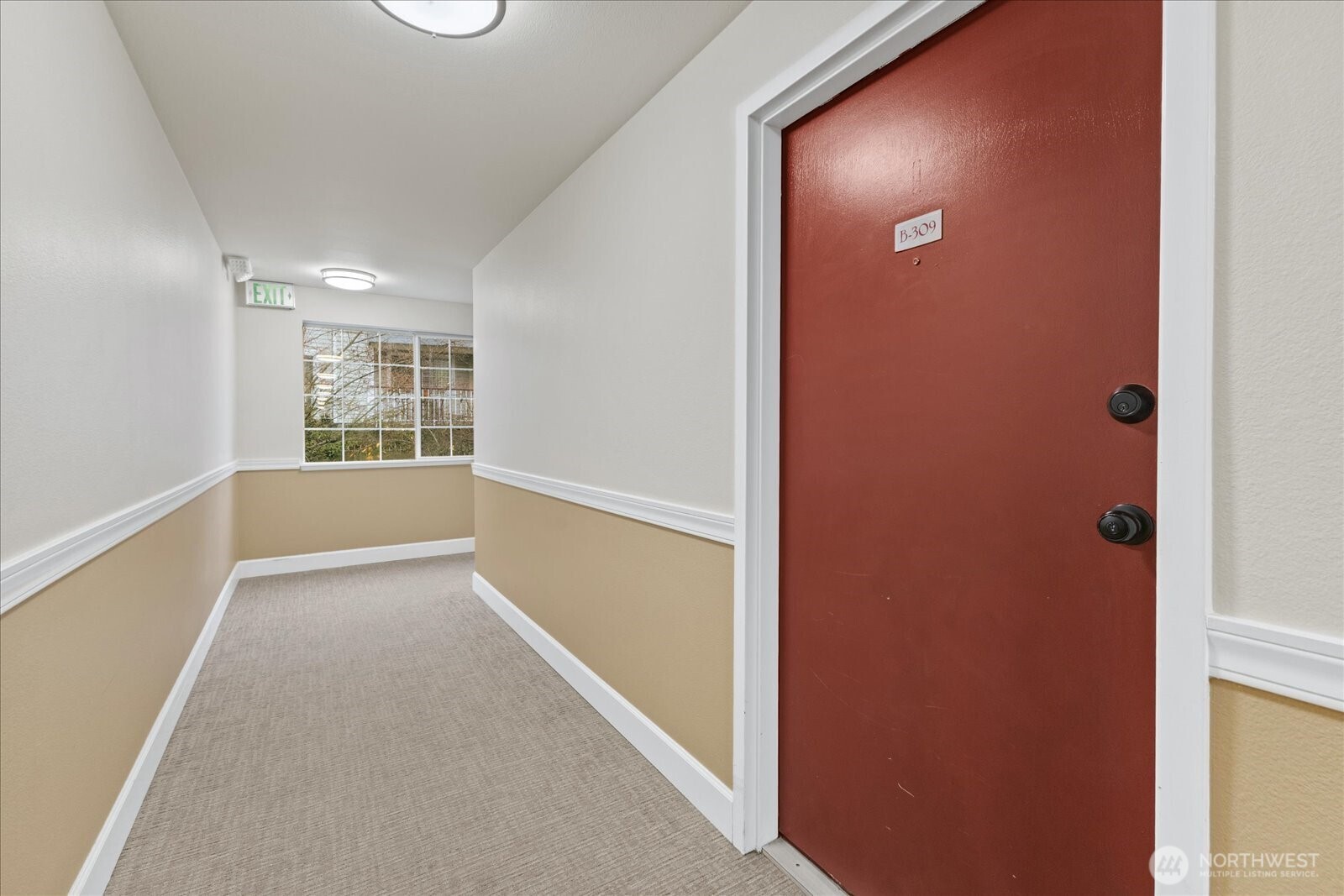 132 Northeast 95th Street, Unit B309 Seattle, WA 98115 - Photo 4 of 24 an empty room with windows
