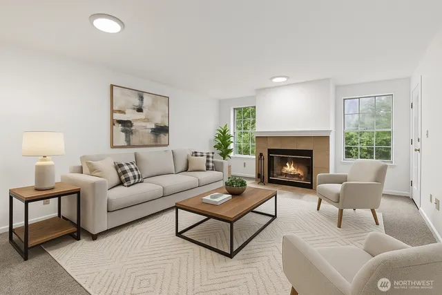 a view of an empty room with a fireplace