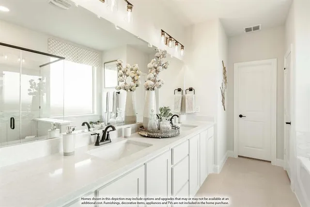 a bathroom with a double vanity sink and mirror