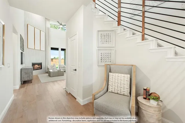 a view of living room filled with furniture