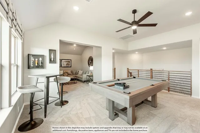 a living room with furniture and a painting