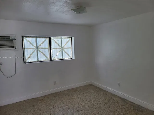 a empty closet with white paint