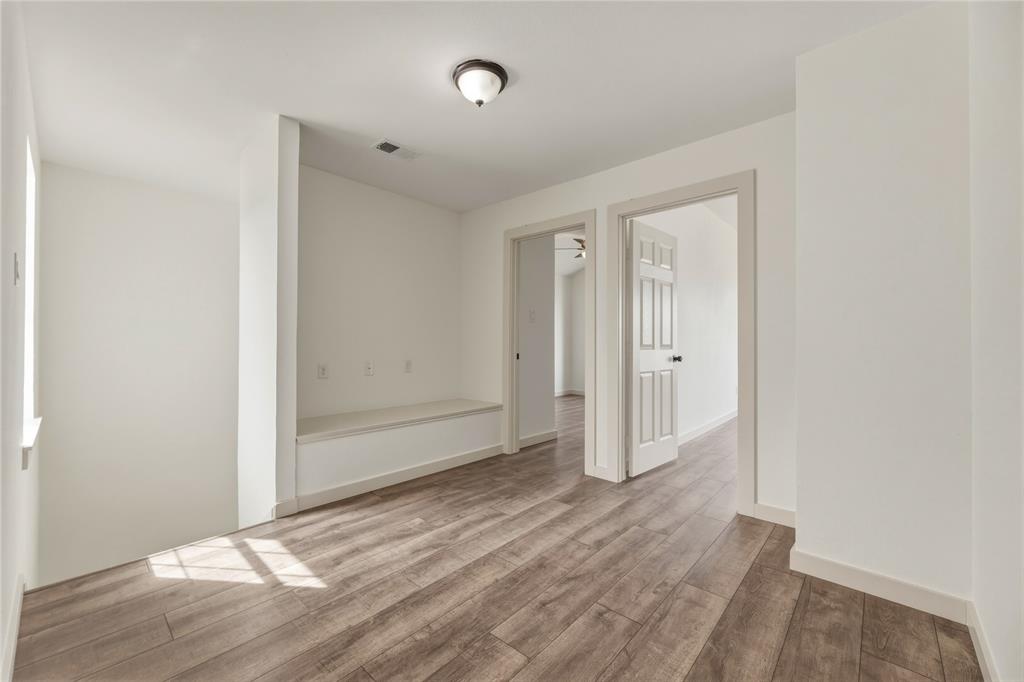 9808 Rockledge Road Fort Worth, TX 76108 - Photo 14 of 30 a view of wooden floor