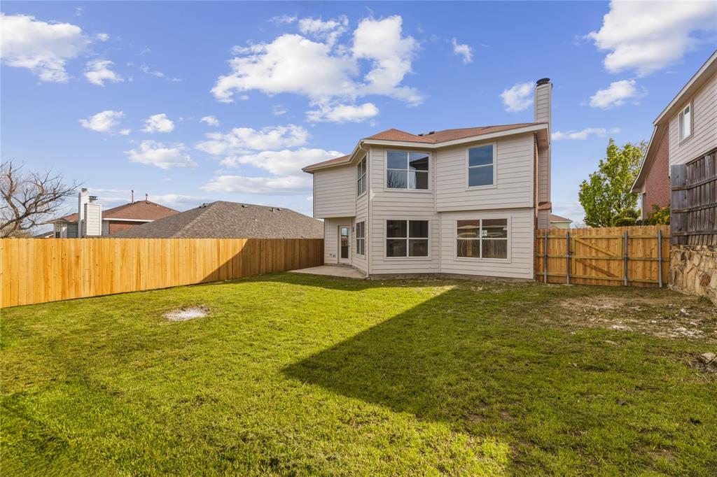 9808 Rockledge Road Fort Worth, TX 76108 - Photo 26 of 30 a view of an house with pool and a yard