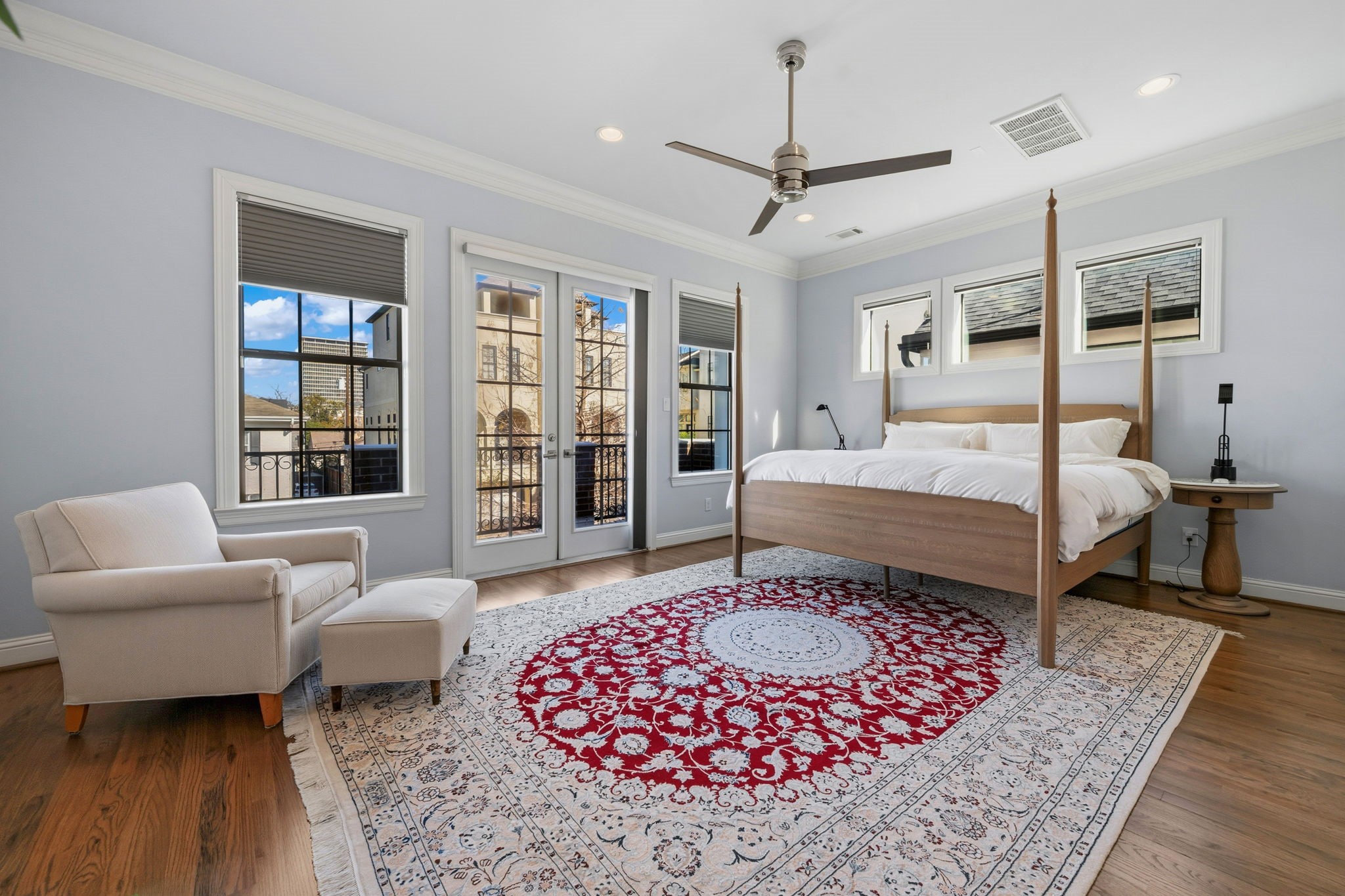 1235 West Bell Street, Unit A Houston, TX 77019 - Photo 12 of 38 Expansive primary bedroom with abundant natural light and elegant design.