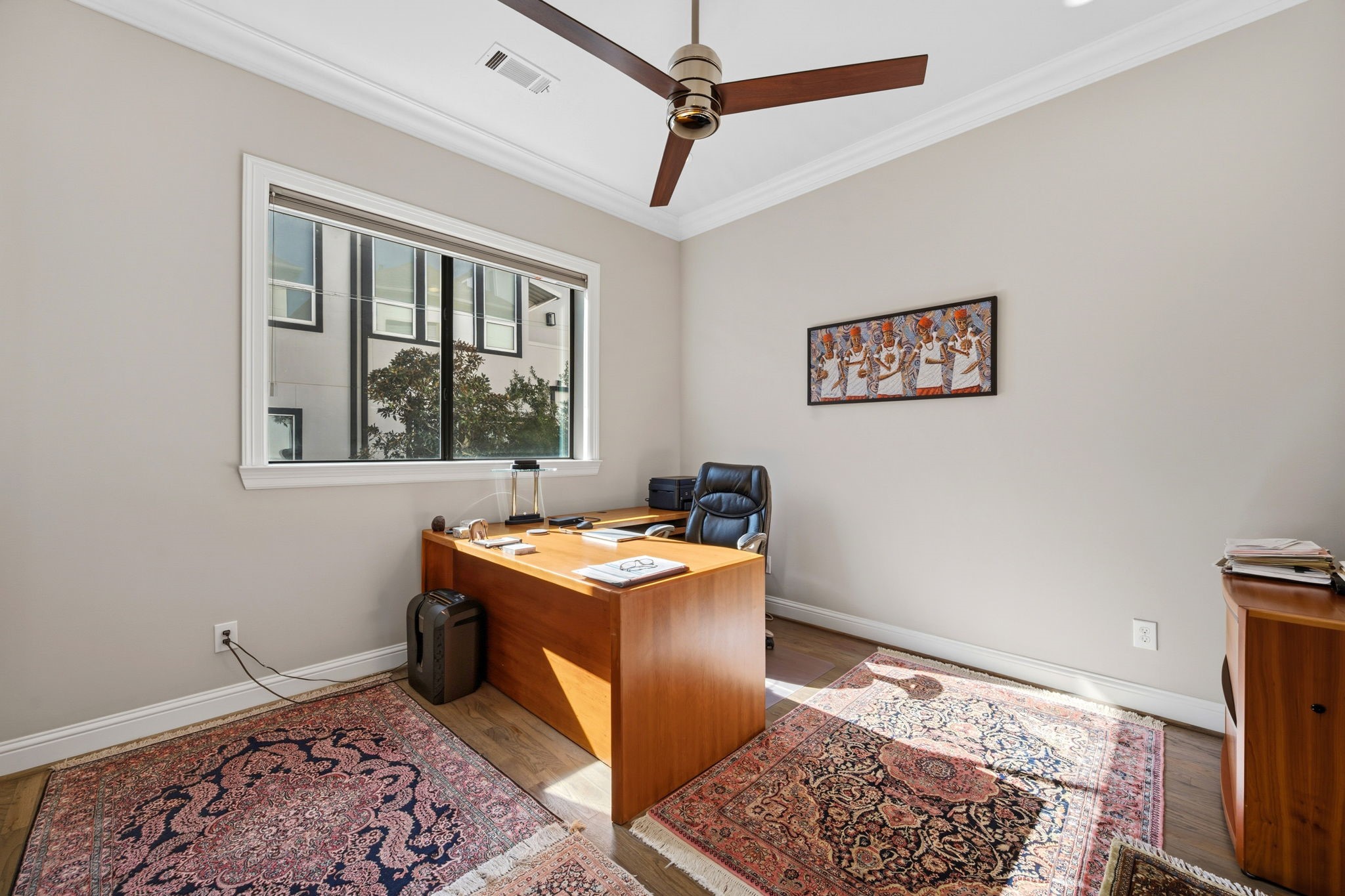 1235 West Bell Street, Unit A Houston, TX 77019 - Photo 19 of 38 Bright second-floor bedroom with ample natural light.