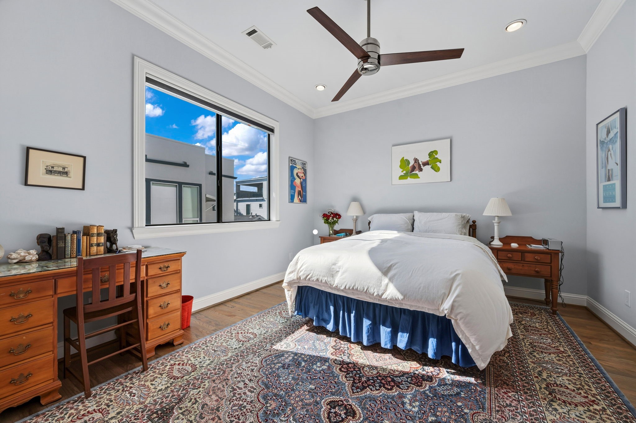 1235 West Bell Street, Unit A Houston, TX 77019 - Photo 30 of 38 a bedroom with a bed and a window