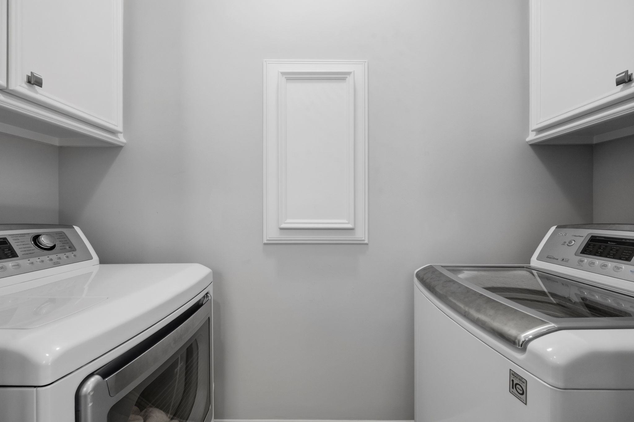 1235 West Bell Street, Unit A Houston, TX 77019 - Photo 32 of 38 Conveniently located on the second floor, the laundry room is just steps from the bedrooms.