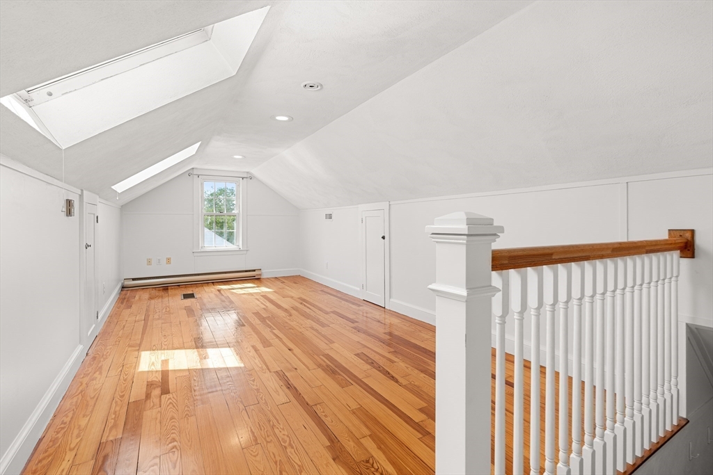 6 Shetland Road Marblehead, MA 01945 - Photo 29 of 39 a view of empty room with wooden floor