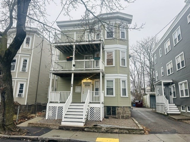 28 Melbourne Street, Unit 3 Boston, MA 02124 - Photo 1 of 27 a front view of a building with a street