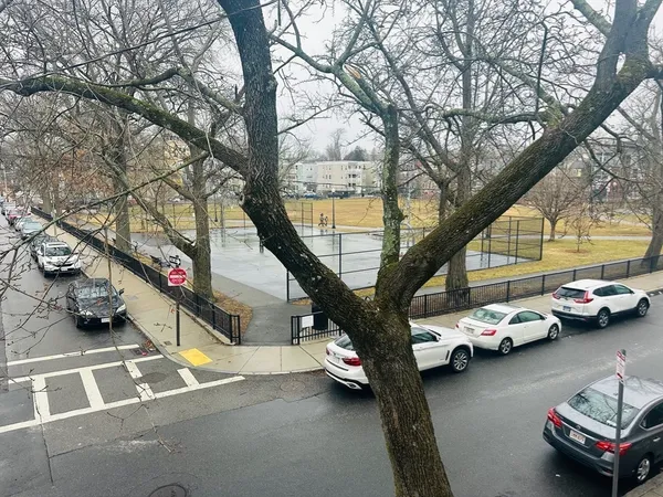 a car parked in front of a house