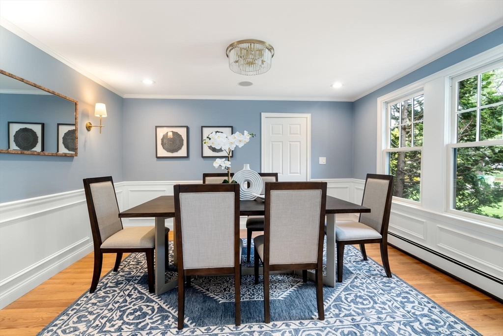 4 Pond Brook Circle Weston, MA 02493 - Photo 11 of 35 a view of a dining room with furniture window and wooden floor