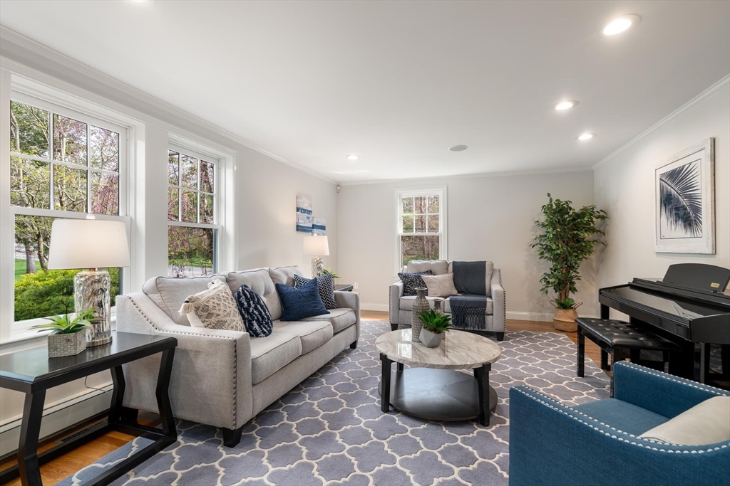 4 Pond Brook Circle Weston, MA 02493 - Photo 13 of 35 a living room with furniture and a potted plant