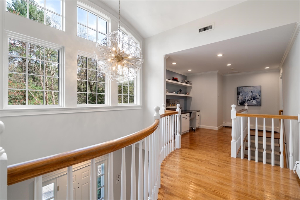 4 Pond Brook Circle Weston, MA 02493 - Photo 14 of 35 a view of a living room and windows