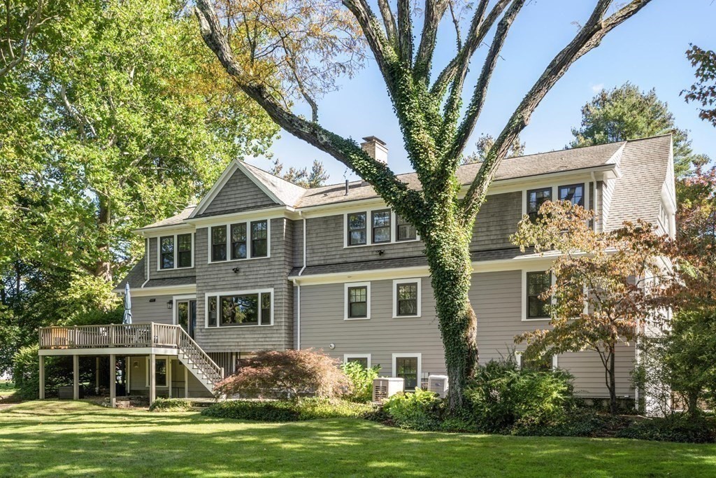 4 Pond Brook Circle Weston, MA 02493 - Photo 31 of 35 a front view of a house with a garden