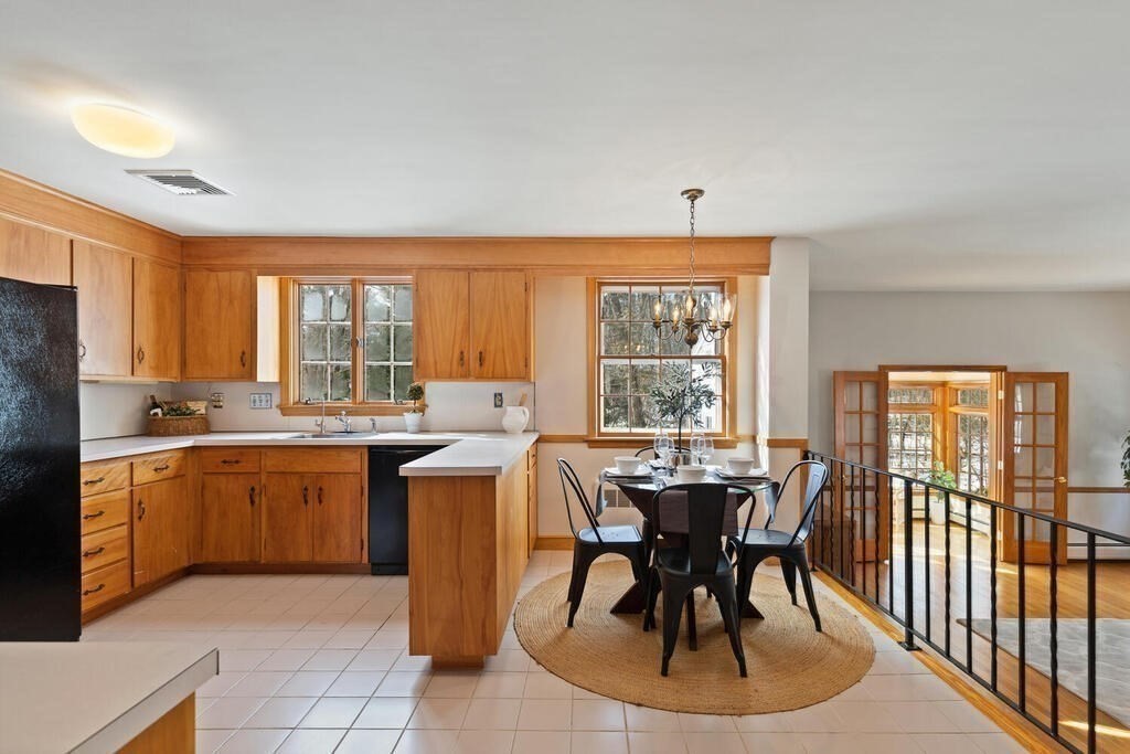 73 Thornberry Road Winchester, MA 01890 - Photo 12 of 39 a view of a dining room with furniture window and outside view