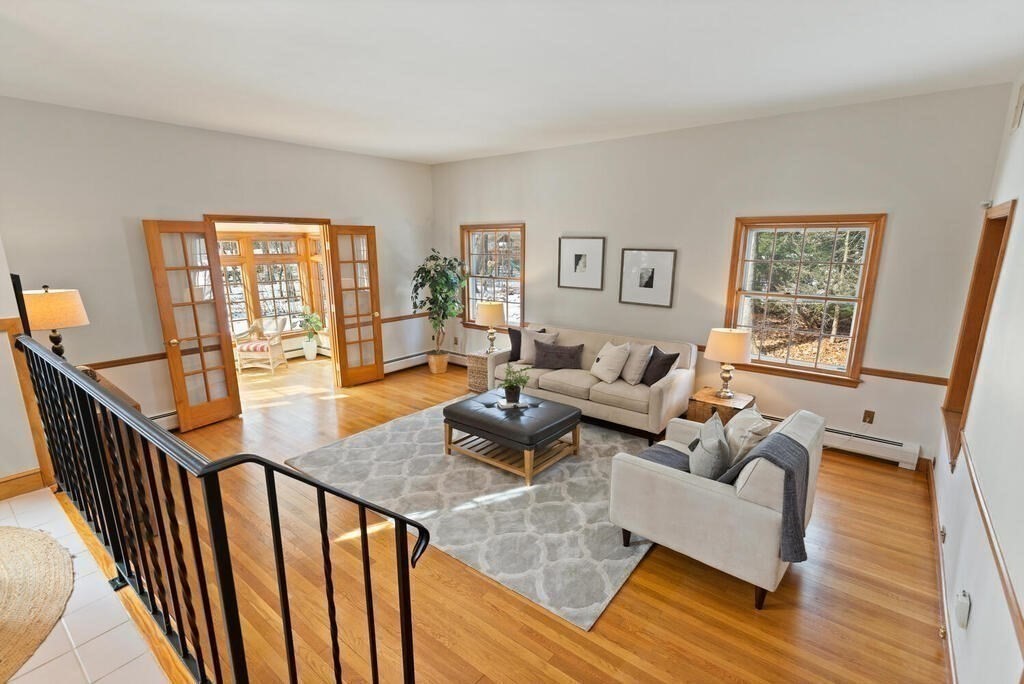 73 Thornberry Road Winchester, MA 01890 - Photo 15 of 39 a living room with furniture and wooden floor