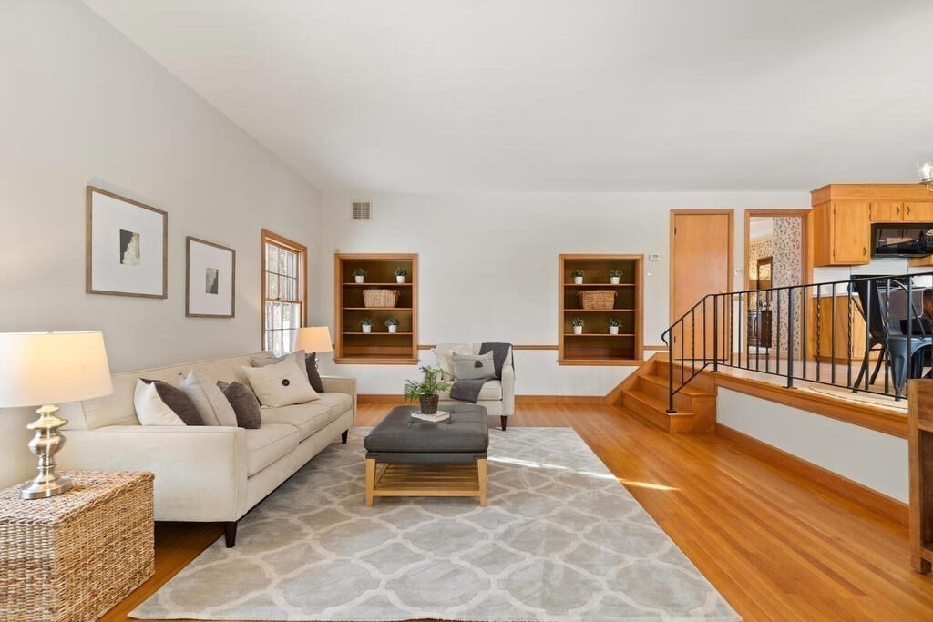 73 Thornberry Road Winchester, MA 01890 - Photo 16 of 39 a living room with furniture and a table with wooden floor