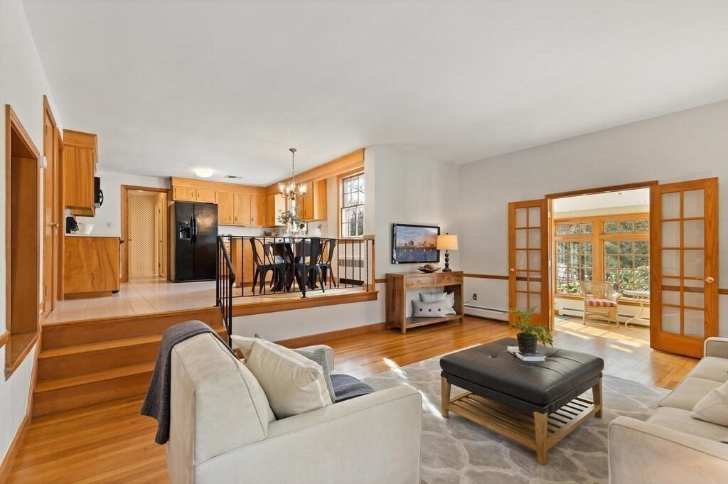 73 Thornberry Road Winchester, MA 01890 - Photo 17 of 39 a living room with furniture and a large window
