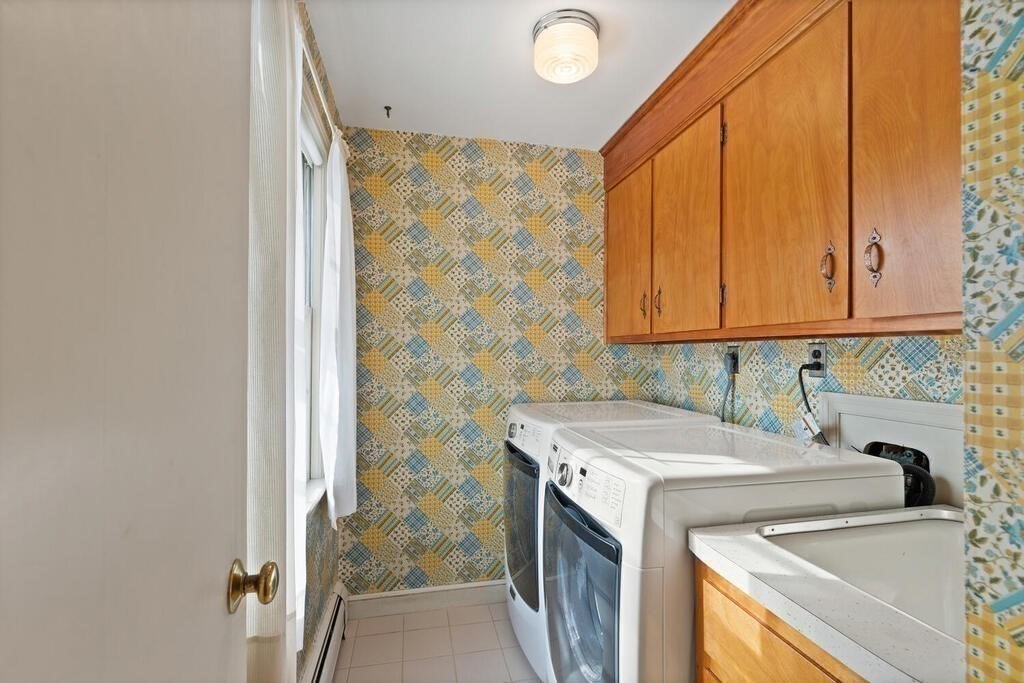 73 Thornberry Road Winchester, MA 01890 - Photo 19 of 39 a utility room with dryer and washer