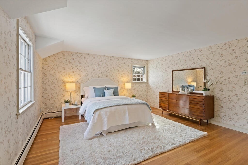 73 Thornberry Road Winchester, MA 01890 - Photo 22 of 39 a bedroom with a bed and wooden floor