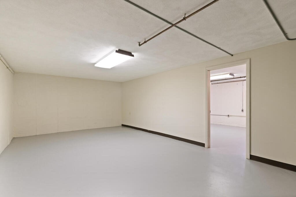 73 Thornberry Road Winchester, MA 01890 - Photo 31 of 39 an empty room with a ceiling fan and a window