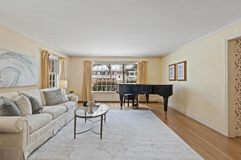 73 Thornberry Road Winchester, MA 01890 - Photo 6 of 39 a living room with furniture and a wooden floor