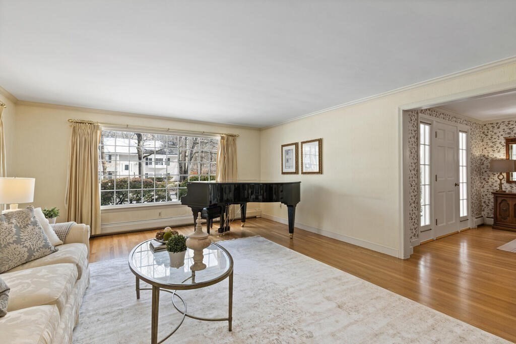 73 Thornberry Road Winchester, MA 01890 - Photo 8 of 39 a living room with furniture and a wooden floor