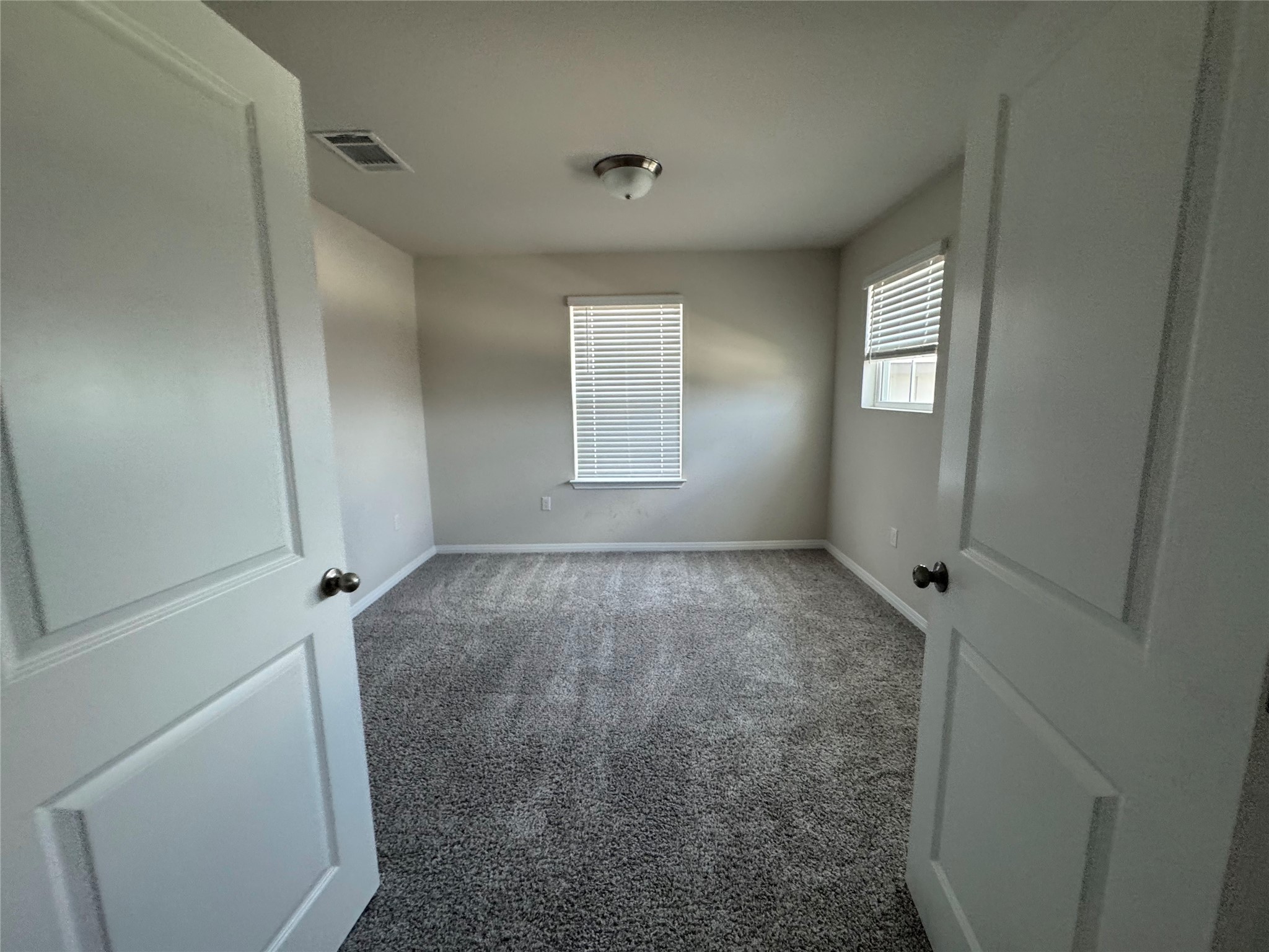 6400 Rounded Pebble Lane Buda, TX 78610 - Photo 15 of 34 a view of room with window and hardwood floor