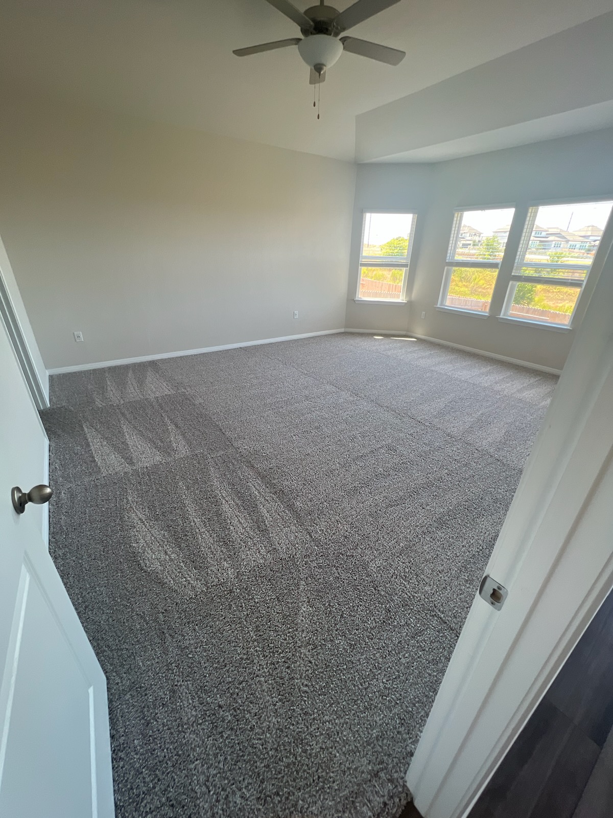6400 Rounded Pebble Lane Buda, TX 78610 - Photo 4 of 34 a view of an empty room and window