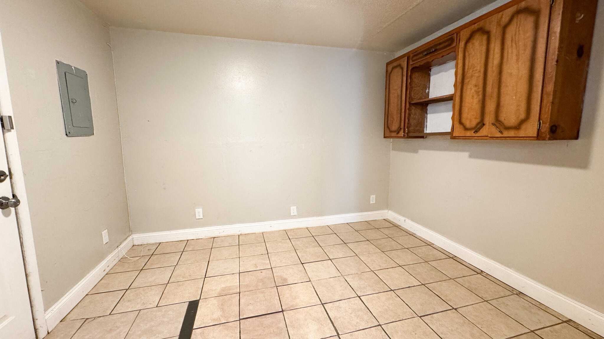 4825 53rd Street Lubbock, TX 79414 - Photo 6 of 13 a view of an empty room and window