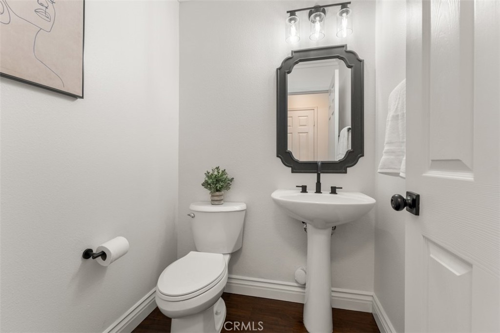 46 Platinum Circle Ladera Ranch, CA 92694 - Photo 13 of 37 a bathroom with a toilet sink and mirror