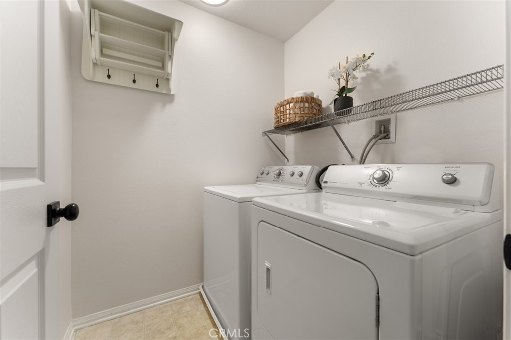 46 Platinum Circle Ladera Ranch, CA 92694 - Photo 16 of 37 a utility room with dryer and washer