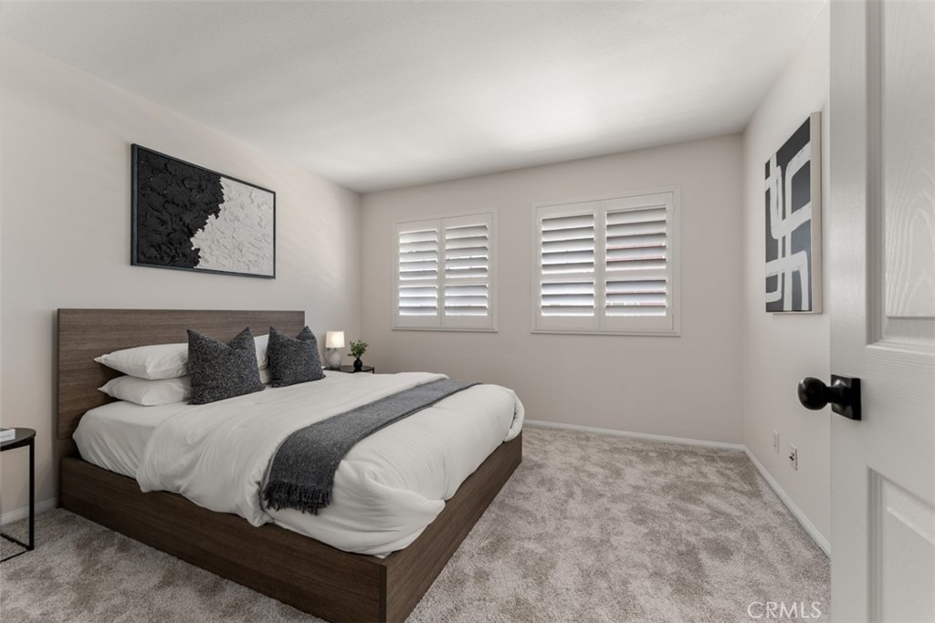 46 Platinum Circle Ladera Ranch, CA 92694 - Photo 17 of 37 a bedroom with a bed and a window