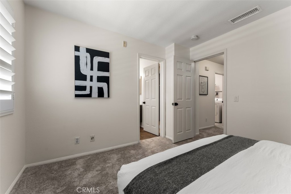 46 Platinum Circle Ladera Ranch, CA 92694 - Photo 18 of 37 a bedroom with a bed and a window