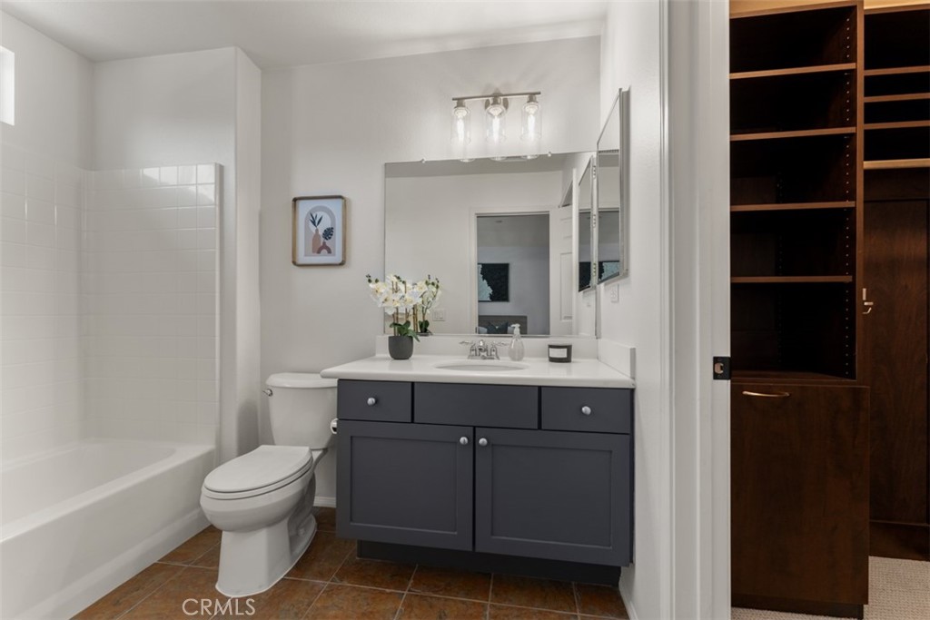 46 Platinum Circle Ladera Ranch, CA 92694 - Photo 19 of 37 a bathroom with a sink a toilet and shower