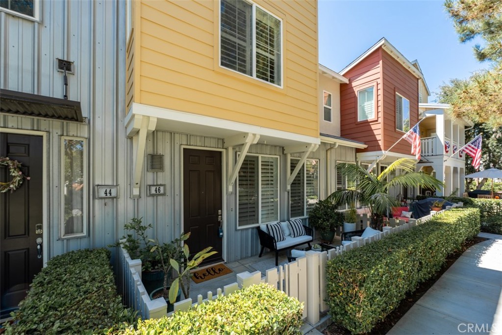 46 Platinum Circle Ladera Ranch, CA 92694 - Photo 2 of 37 a front view of house and yard with beautiful flowers and green space