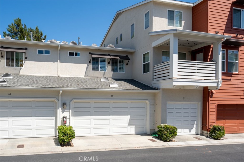 46 Platinum Circle Ladera Ranch, CA 92694 - Photo 28 of 37 a front view of a house with garage and parking