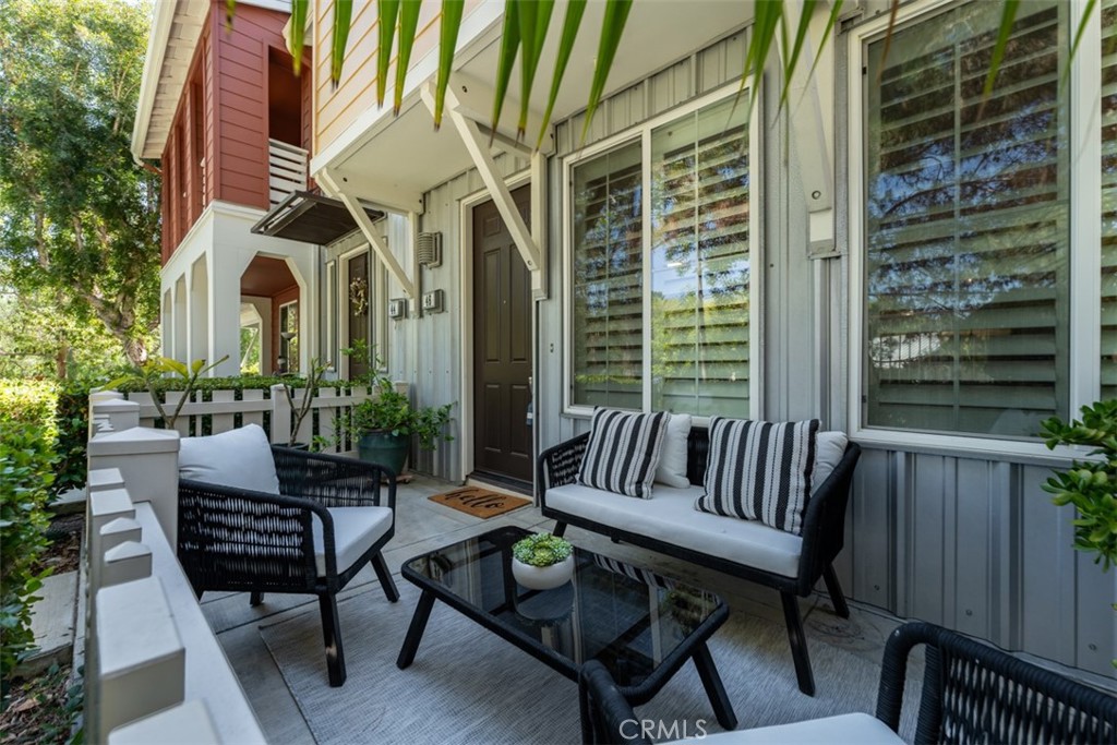 46 Platinum Circle Ladera Ranch, CA 92694 - Photo 3 of 37 a view of a patio with couches table and chairs and potted plants