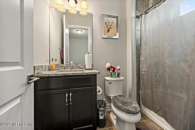 a bathroom with a sink and a toilet