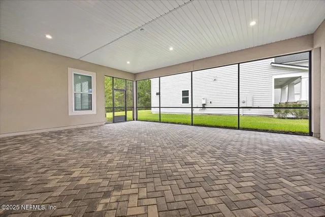 a view of a garden with an empty room