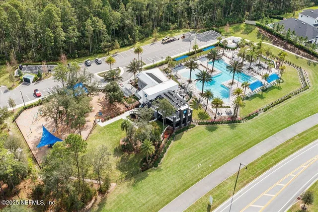 a view of a yard with swimming pool