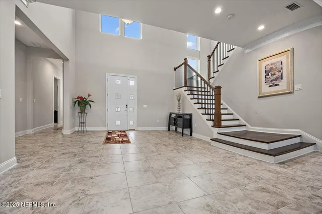 a view of an entryway with stairs